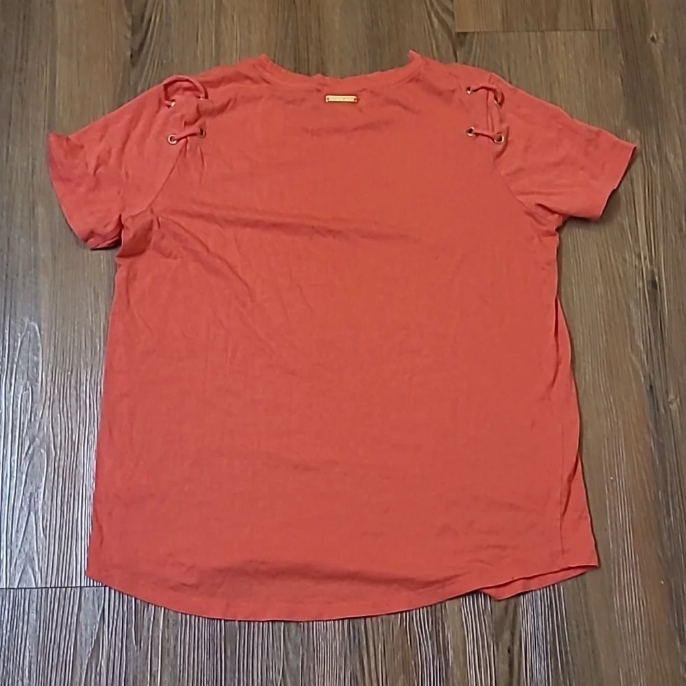 Michael Kors Orange Short Sleeve Top with Lace-Up Detail used good condition‎